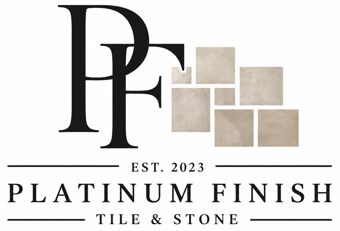 Logo for Platinum Finish Tile & Stone. Gray and black circle with tiles and phone number.
