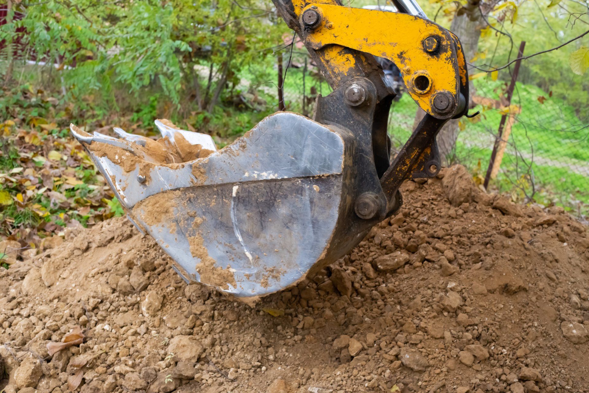 Digging Soil with Excavator Truck — Plymouth, IN — Creed Septic System Specialist Digging Soil with Excavator Truck — Plymouth, IN — Creed Septic System Specialist