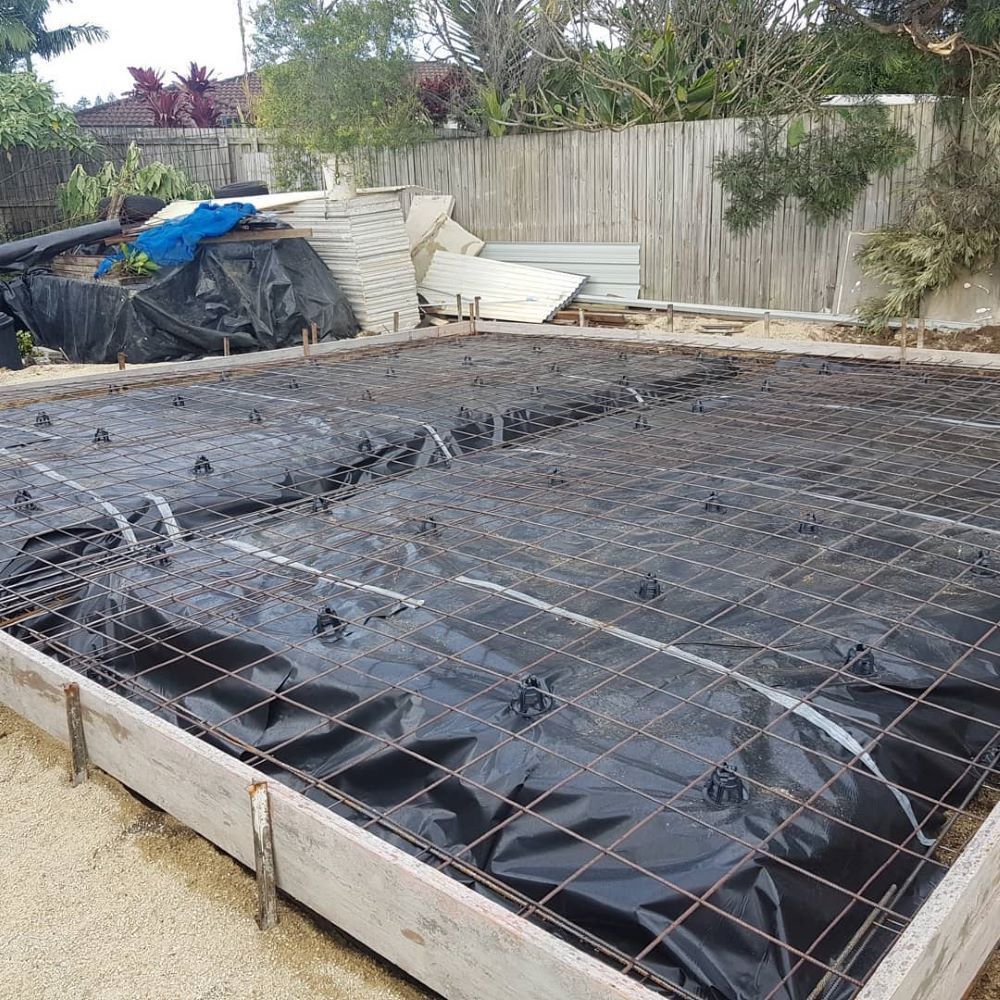 A Concrete Foundation is Being Built in a Backyard — TJ Concreting in Grafton, NSW