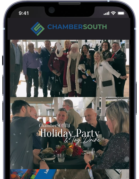 A cell phone with a picture of a holiday party on the screen.