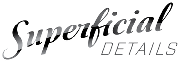 Stylized black and gray logo reading &ldquo;Superficial Details&rdquo; on a white background