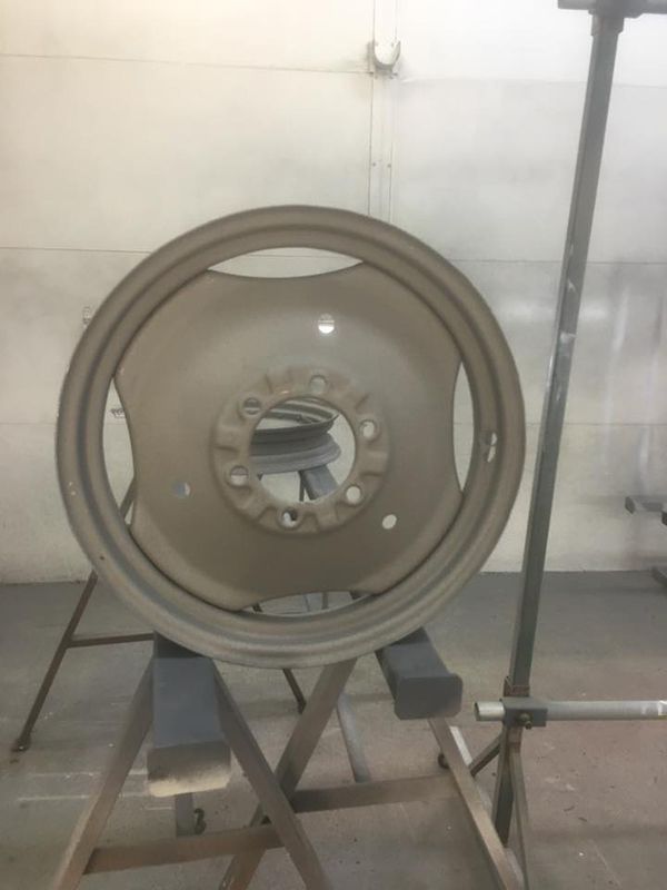A Close-Up of A Wheel on A Stand with Powder Coating Paint — ASSB Armidale Sand And Soda Blasting In Guyra, NSW