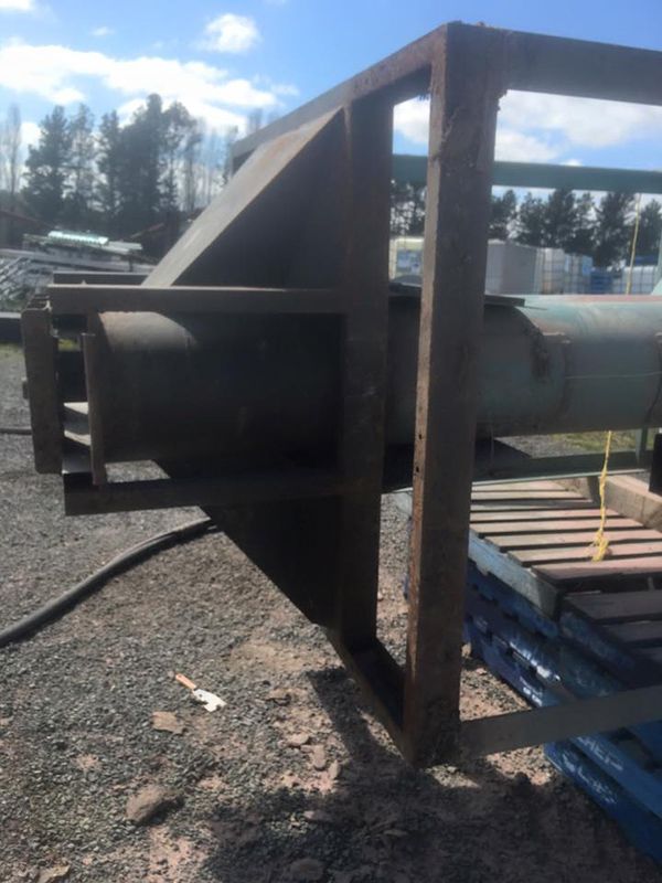 A Large Piece of Metal Is Sitting on The Ground Before Painting — ASSB Armidale Sand And Soda Blasting In Guyra, NSW