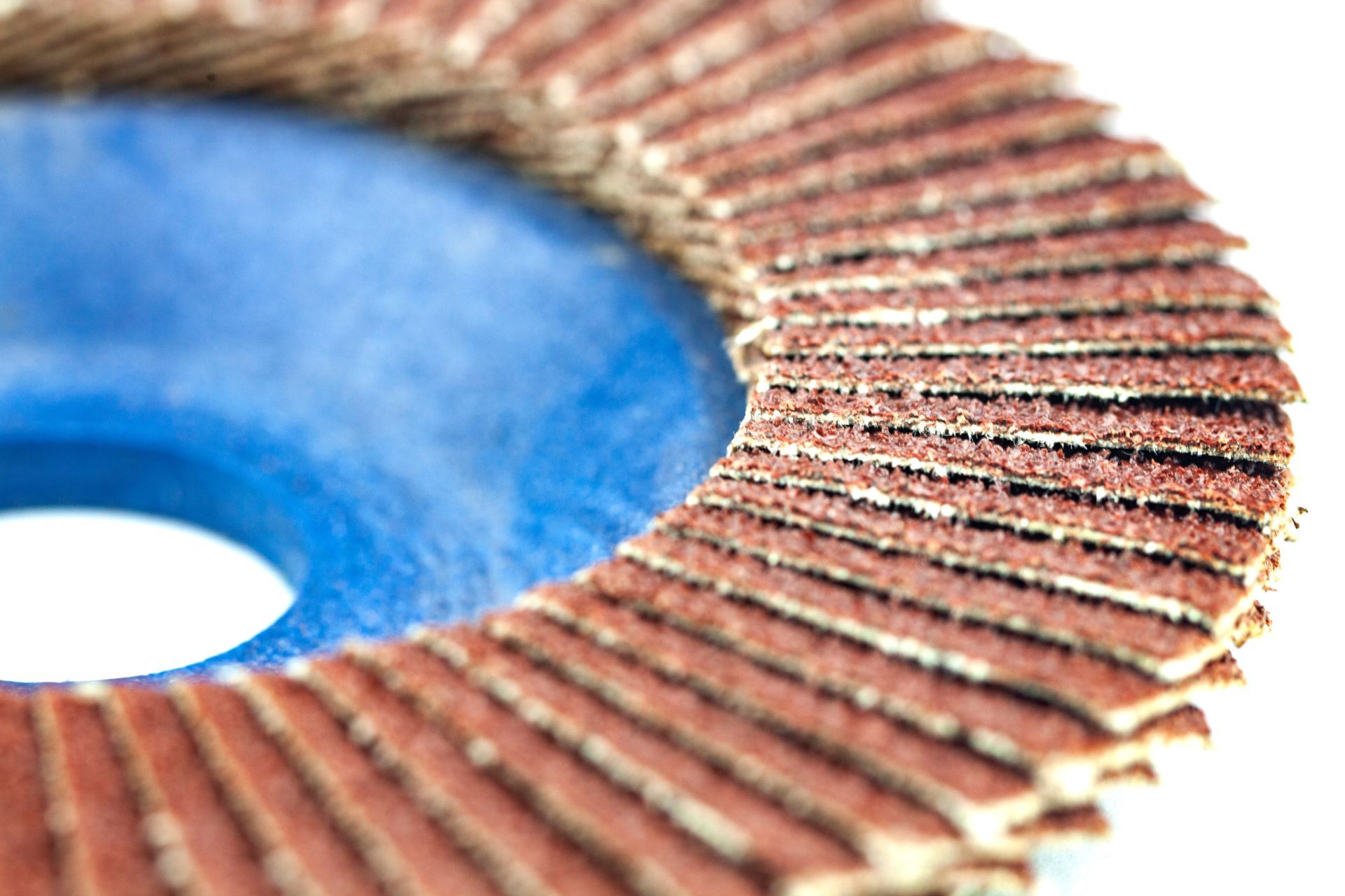 Close-up of an abrasive sandpaper, showcasing industrial abrasives.