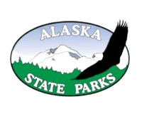 Alaska State Parks logo with white mountains, green hills, and a black eagle silhouette