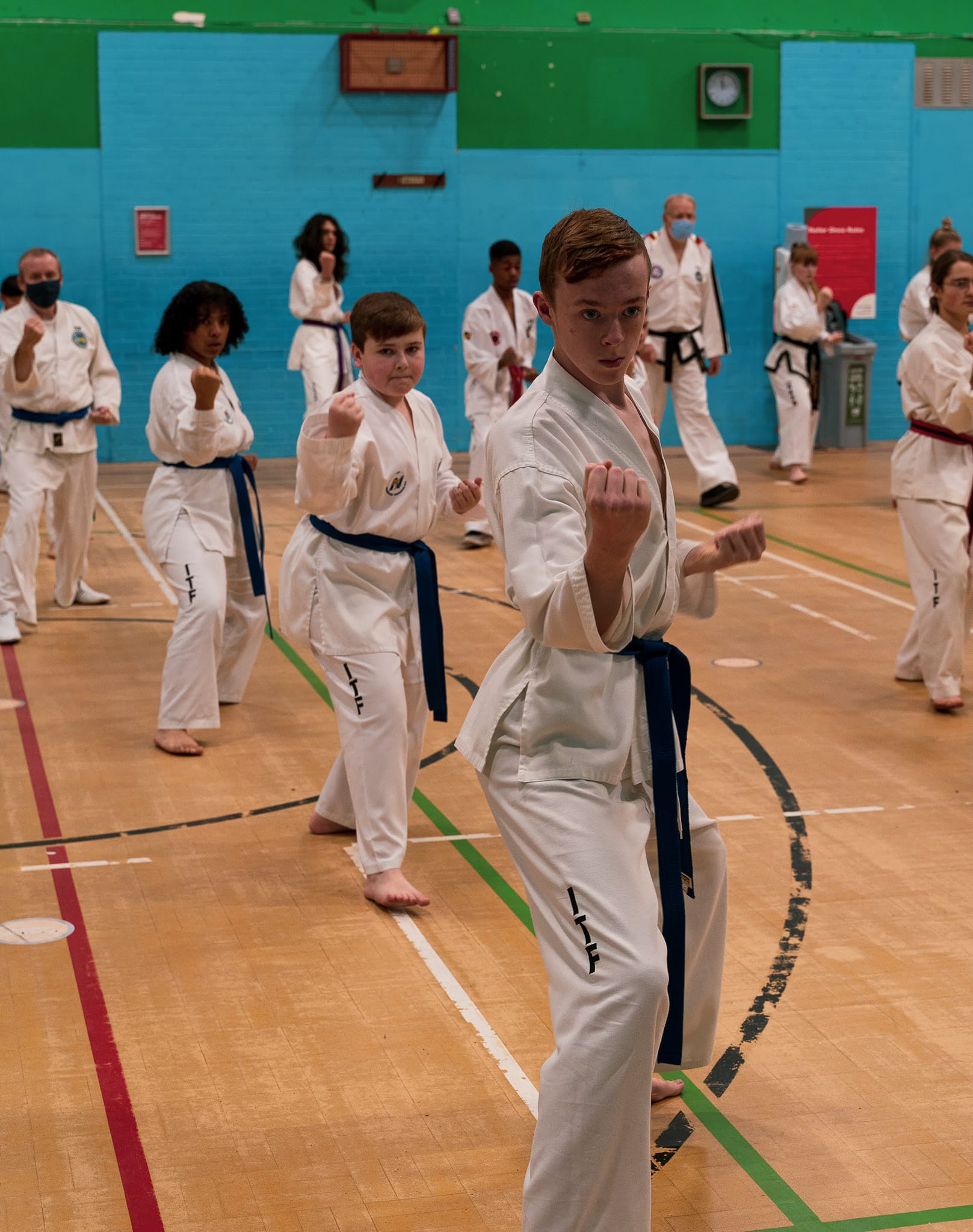 Blue belt students blocking