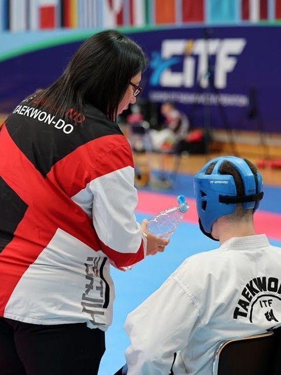 Danielle Williams coaching George Wright in sparring at the 2024 European Taekwon-Do Championships