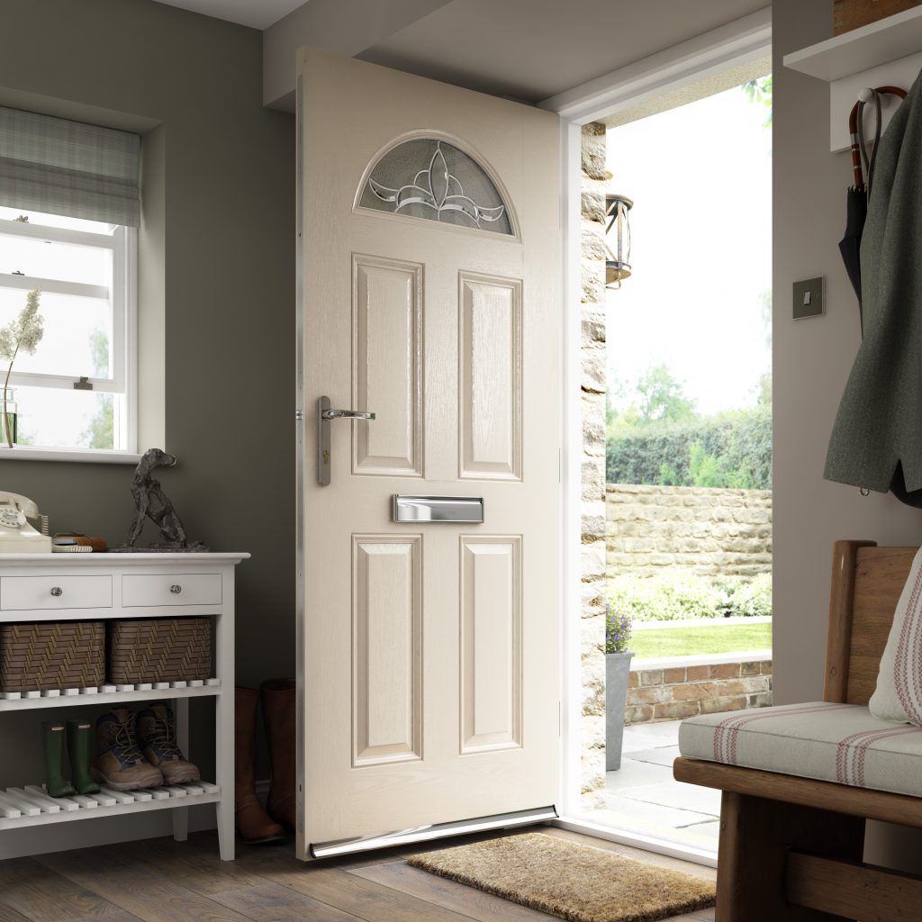 a hallway with a white door and a window