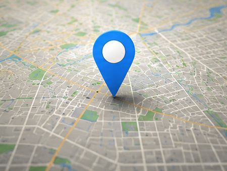 Blue location pin on a city map