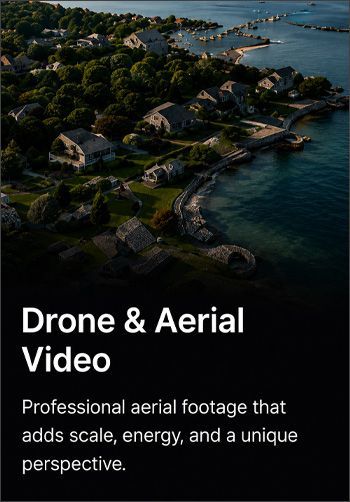 Aerial view of coastal houses and shoreline with text: “Drone & Aerial Video”