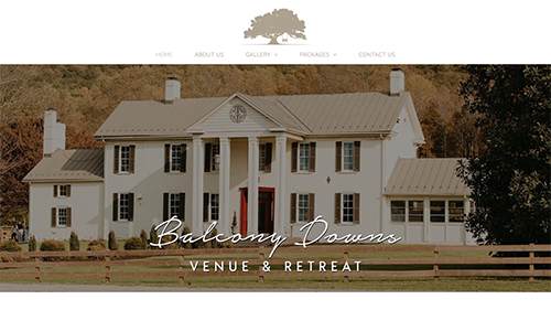 White Southern mansion with columns and wraparound porch, labeled “Barnsley Resort Venue & Retreat”