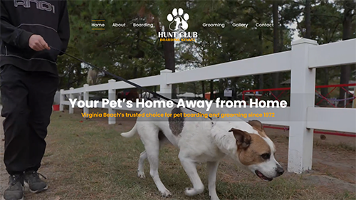 Dog walking beside a white fence on a pet boarding website homepage with the text “Your Pet’s Home Away from Home”