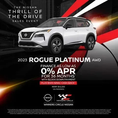 White 2023 Nissan Rogue Platinum AWD on black-and-red sale ad, 0% APR for 36 months at Winner's Circle Nissan