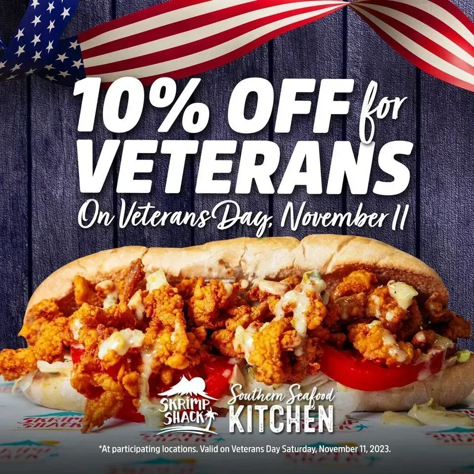 10% off veterans promo with American flag and fried chicken platter on Veterans Day, November 11