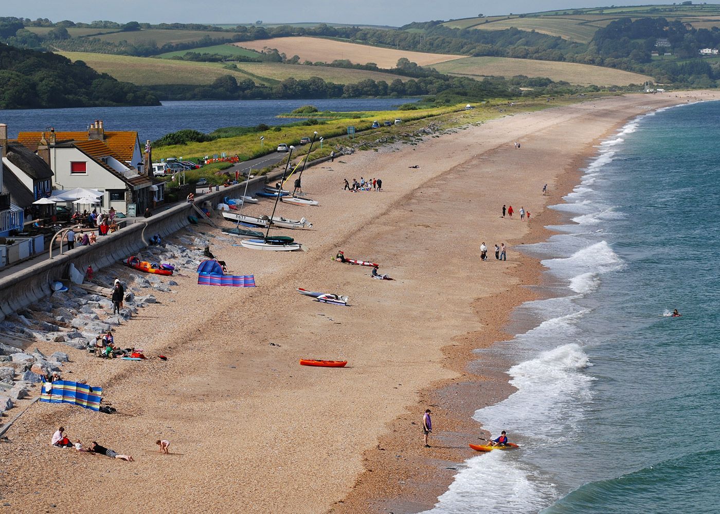 A beach with a lot of people on it