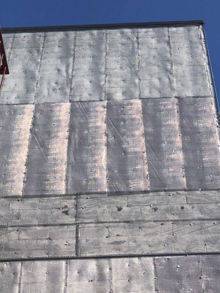 A close up of a building with a blue sky in the background