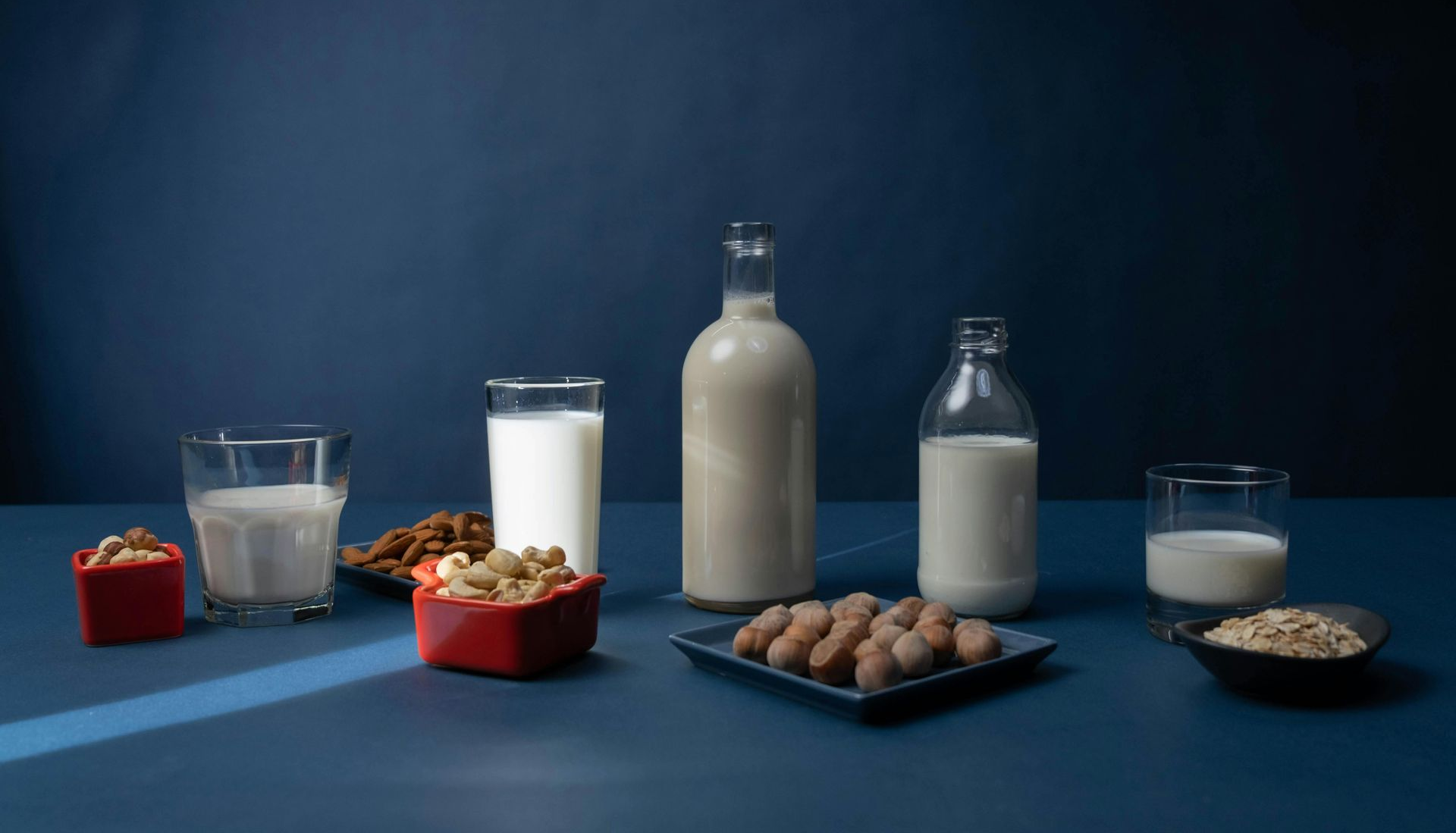 Different types of milk on table