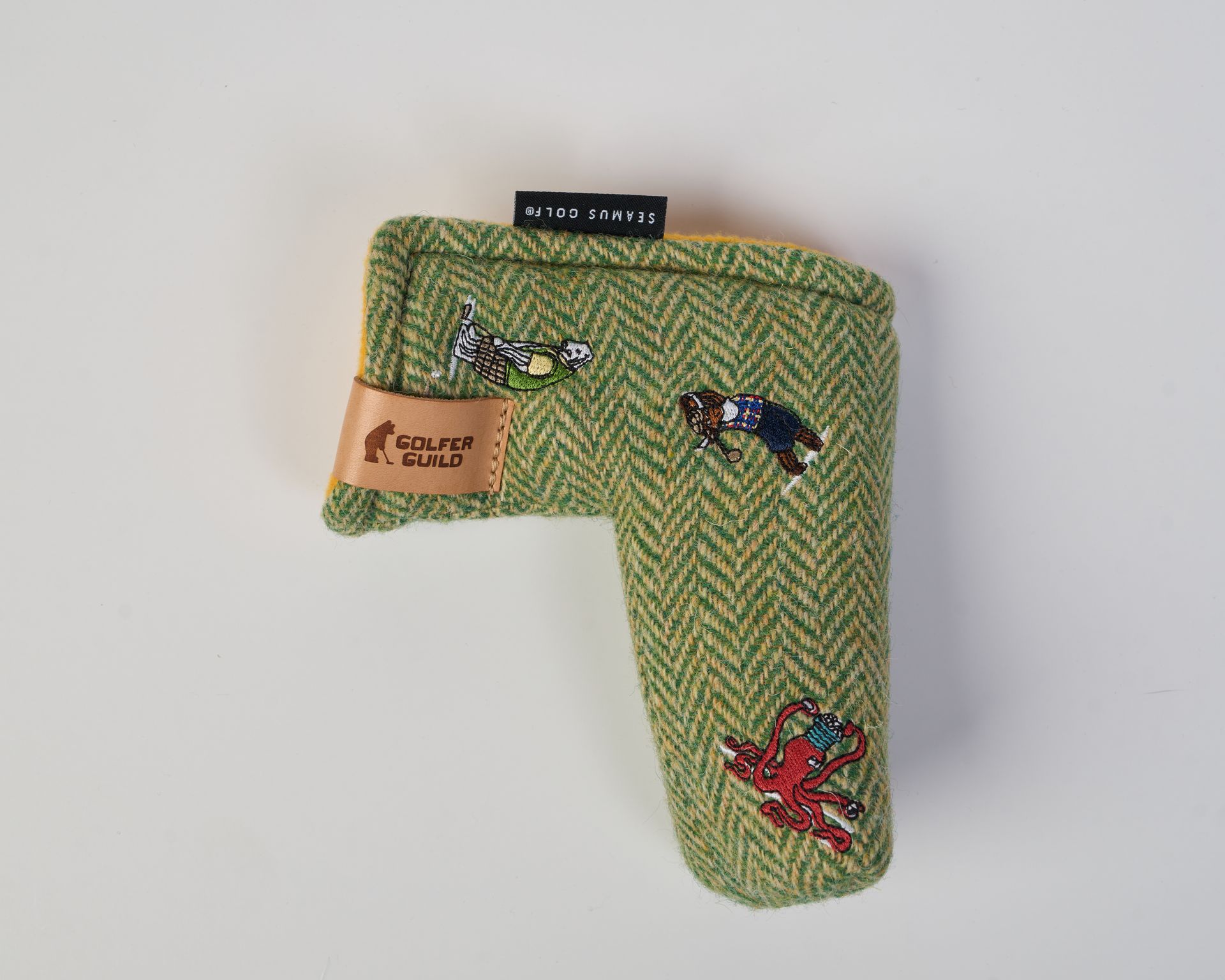 Golfer Guild Fescue Harris Tweed headcover hand-woven in Scotland with golfing animal pattern. Art by Jonas Claesson.