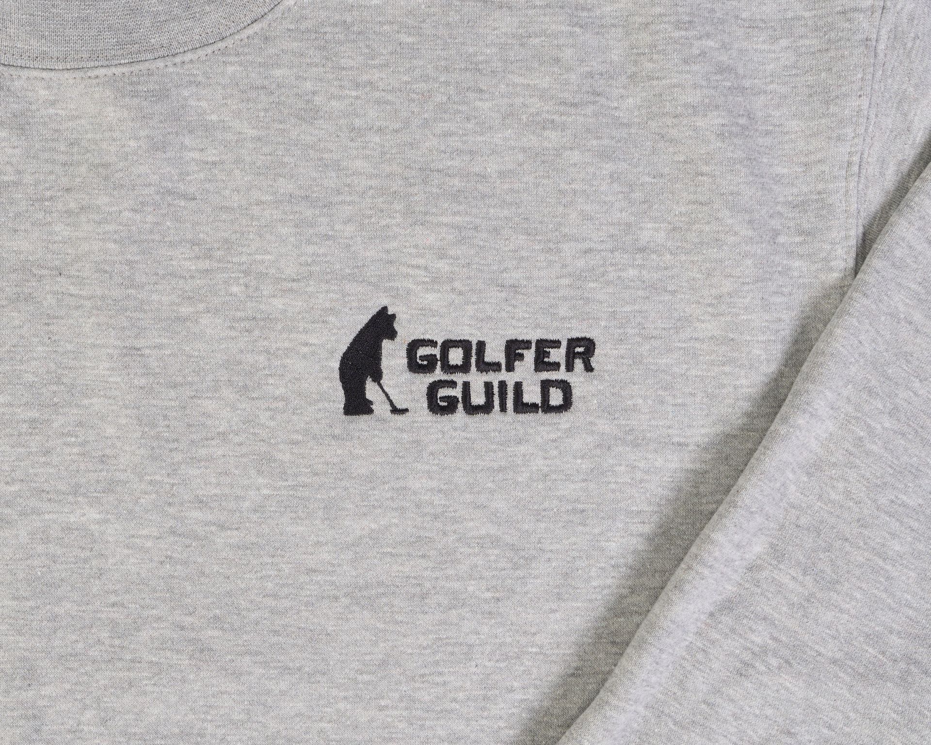 Golfer Guild Coziest Sweater featuring Jonas Claesson golfing animal artwork in soft cotton fleece