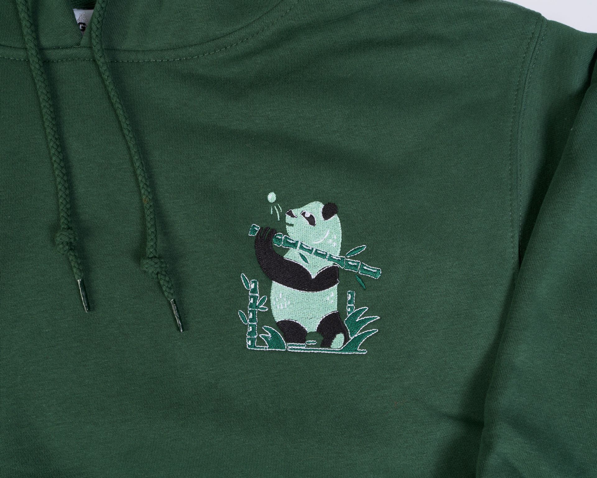Golfer Guild Coziest Hoodie with golfing animal panda art by Zaine Vaun in ultra-soft fleece