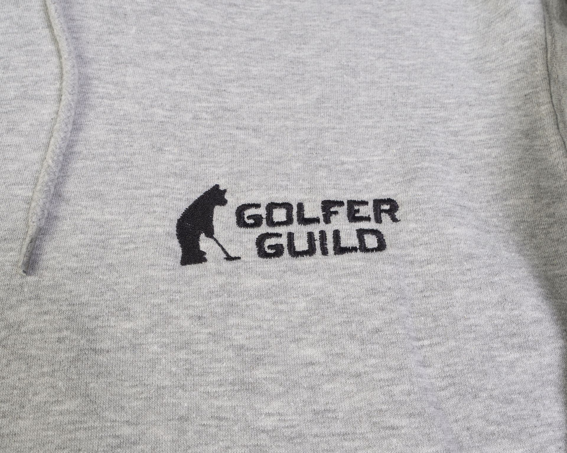 Golfer Guild Coziest Hoodie with Jonas Claesson golfing animal art, sustainable cotton fleece