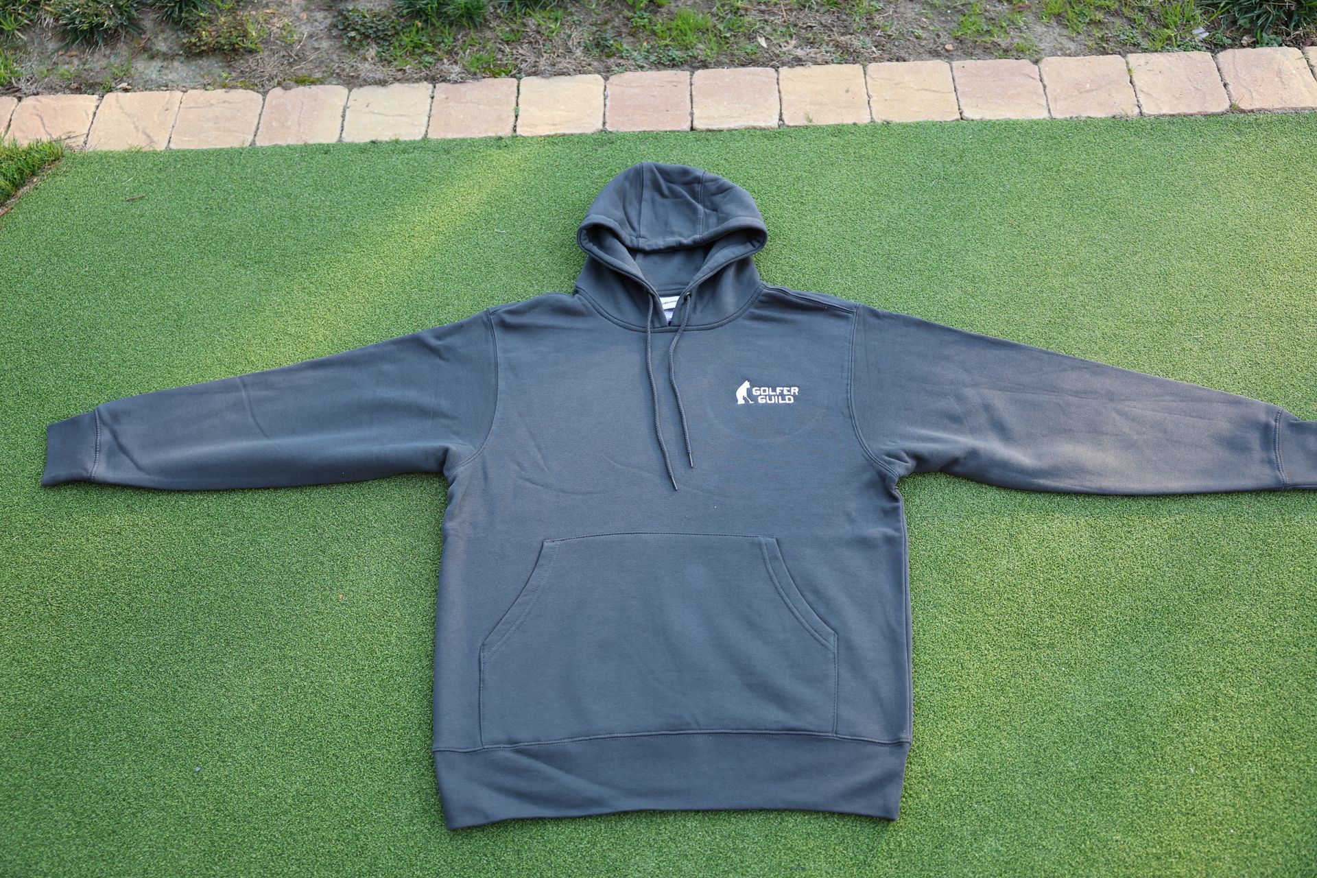Golfer Guild Coziest Hoodie with Jonas Claesson golfing-animal art, sustainable cotton fleece