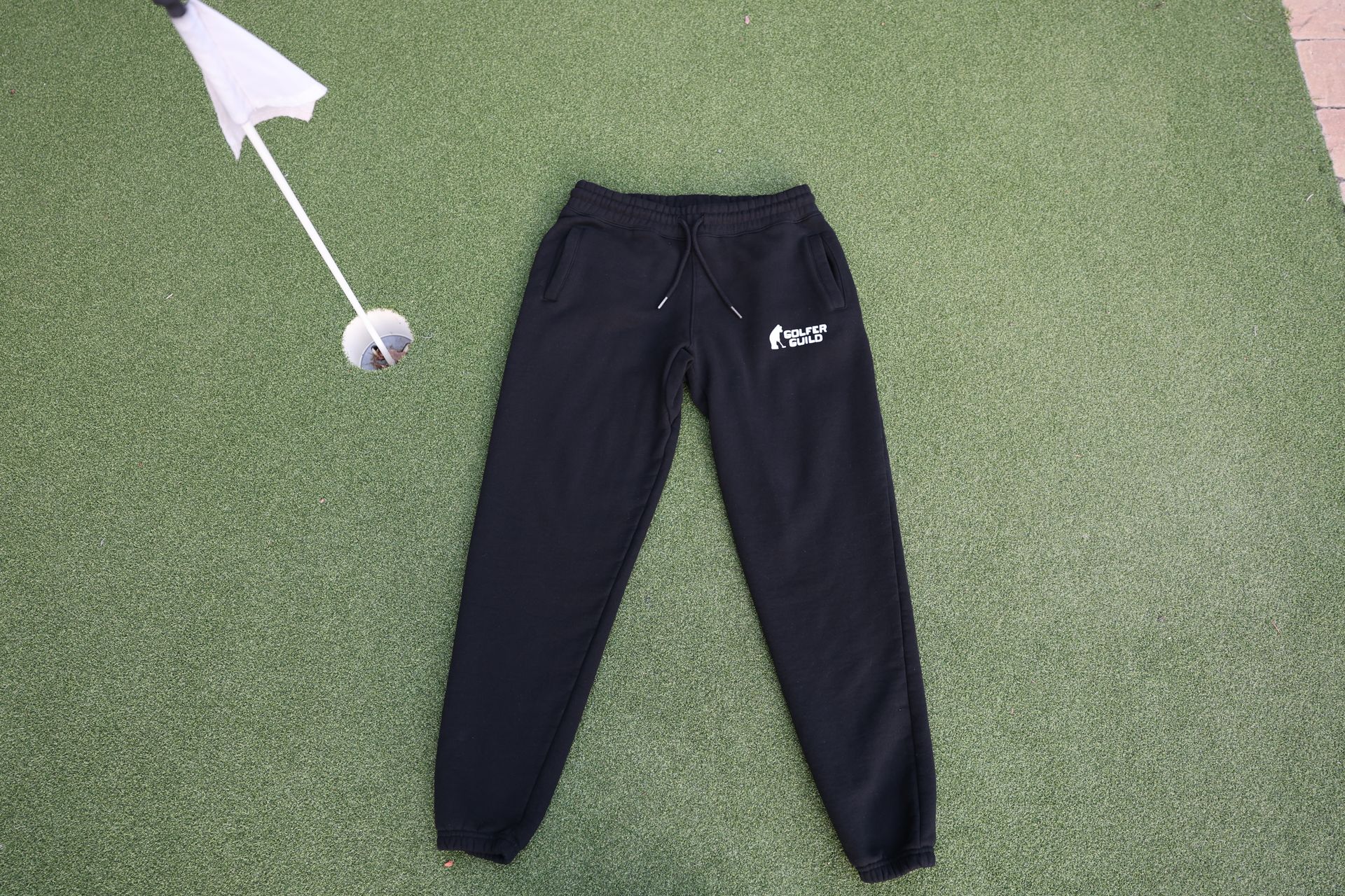Golfer Guild Coziest Sweatpants in organic cotton with recycled fibers and golfing animal logo artwork