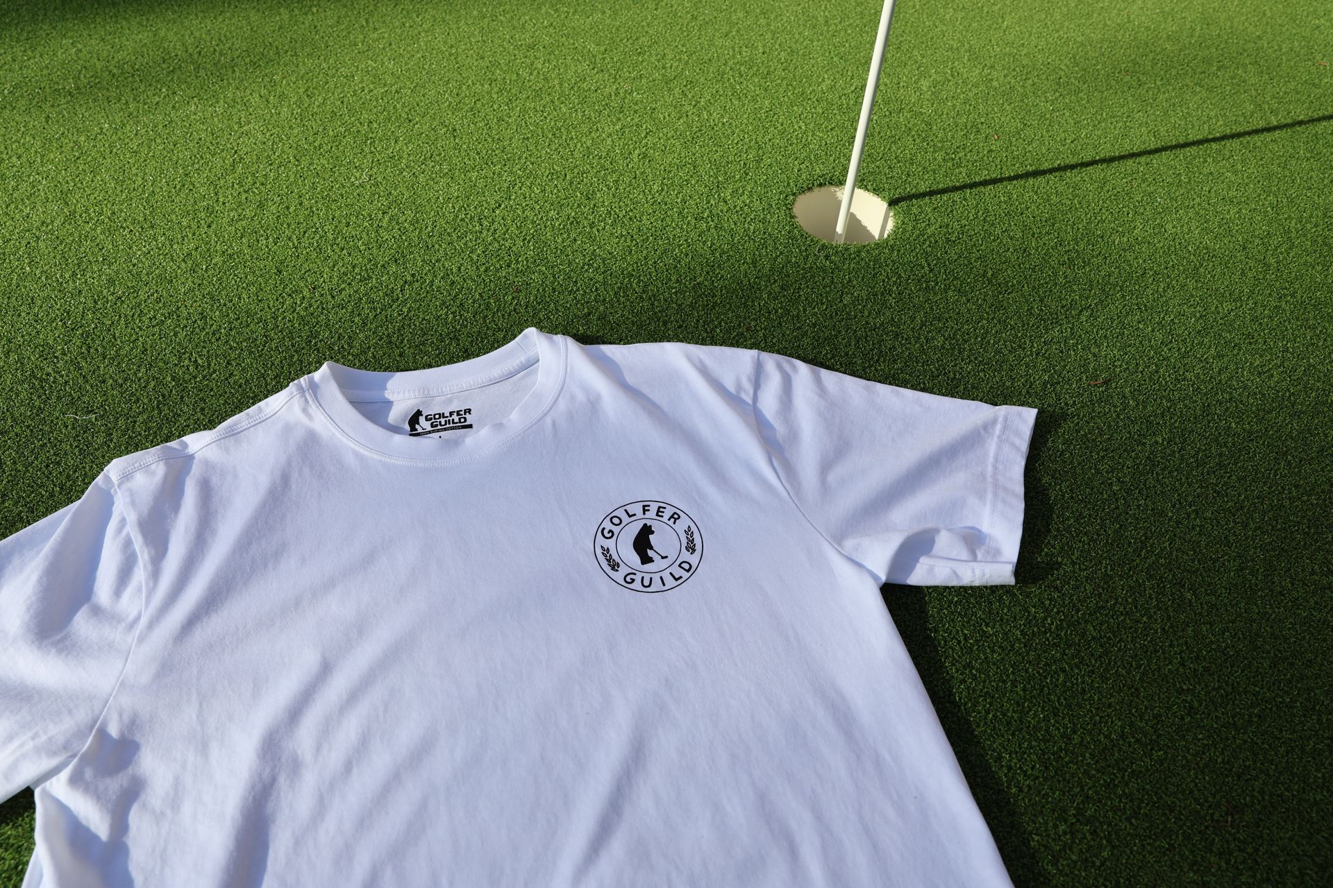 Golfer Guild SUPIMA® Bear Drive tee featuring golfing animal bear artwork by Jonas Claesson.