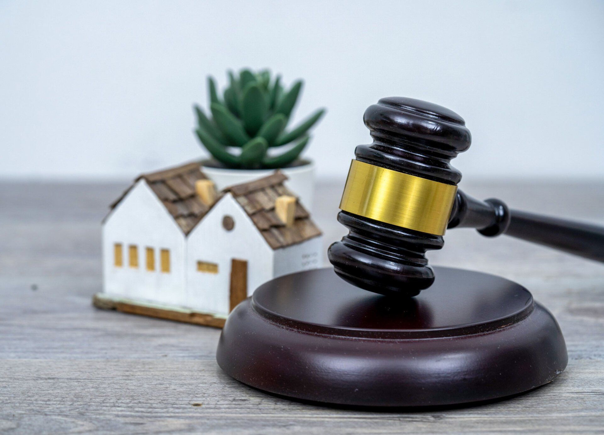 House with gavel | Richmond, NSW | Shaddicks Lawyers