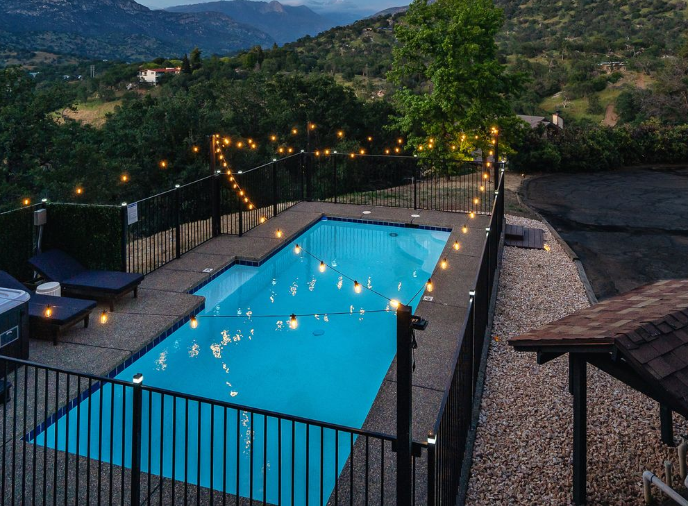 Sierra Skyline private pool at night with string lights