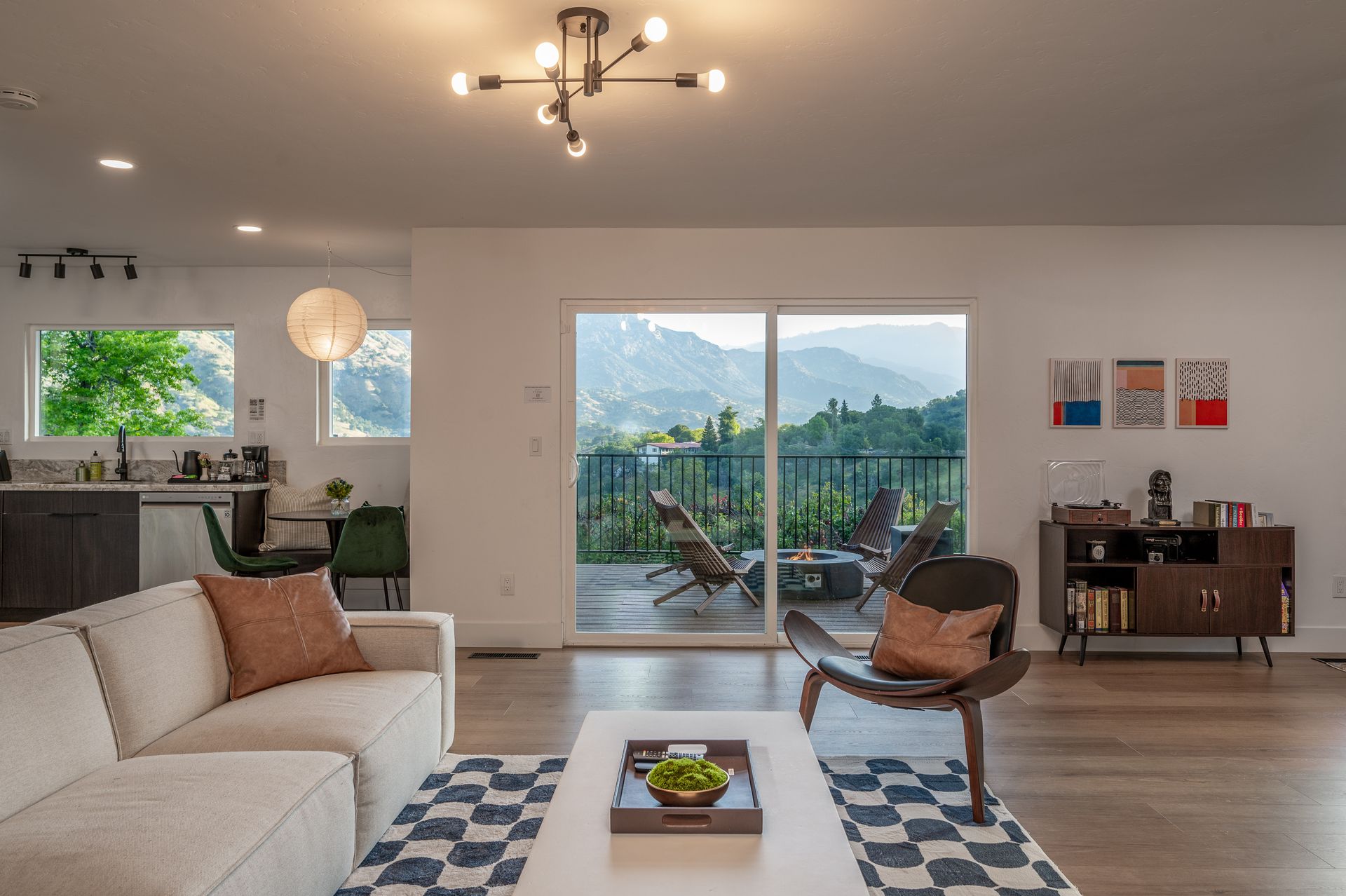 Sierra Skyline open-concept living room with natural light and mountain views