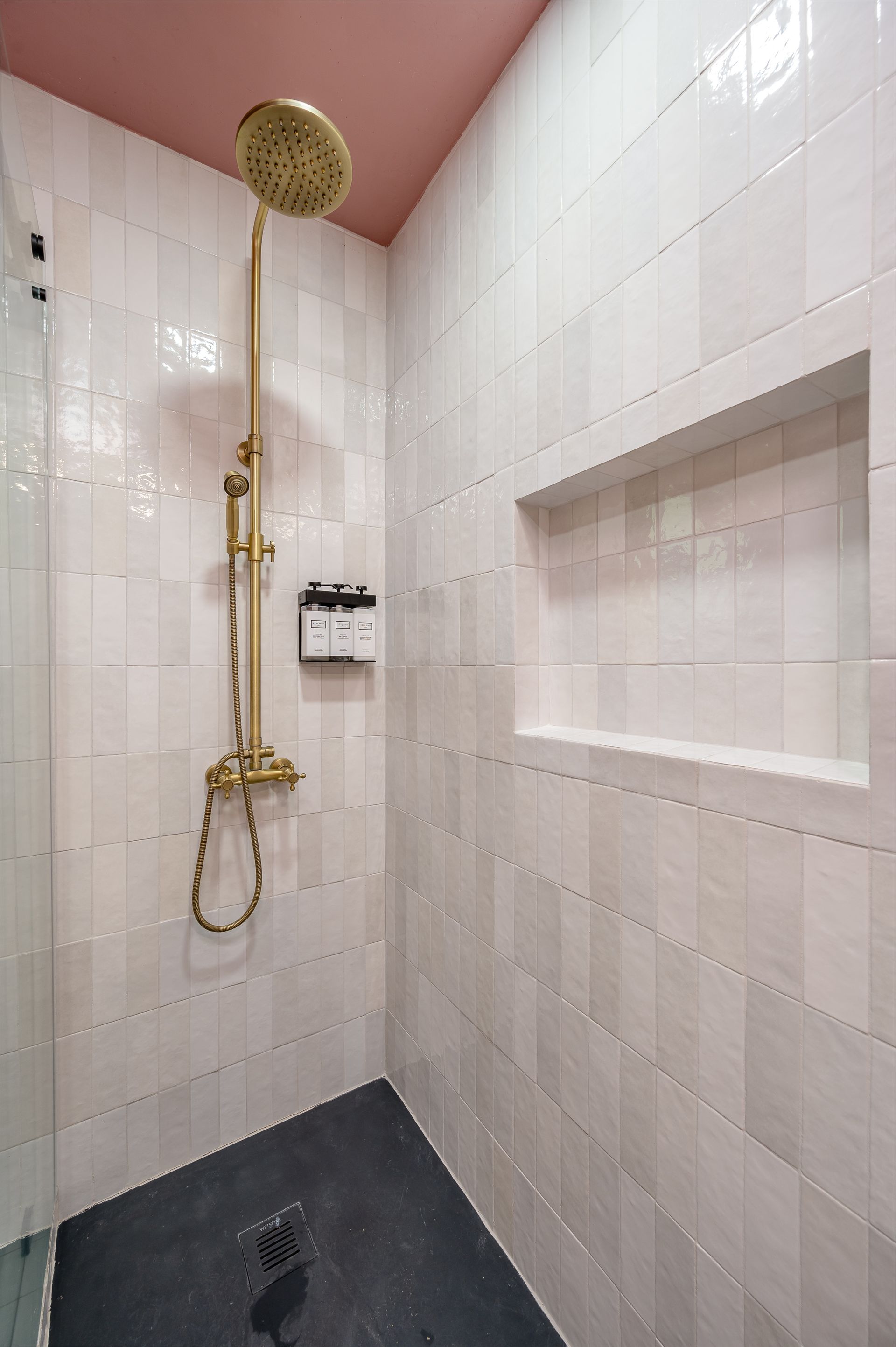 Sierra Skyline luxury bathroom with gold rainfall shower