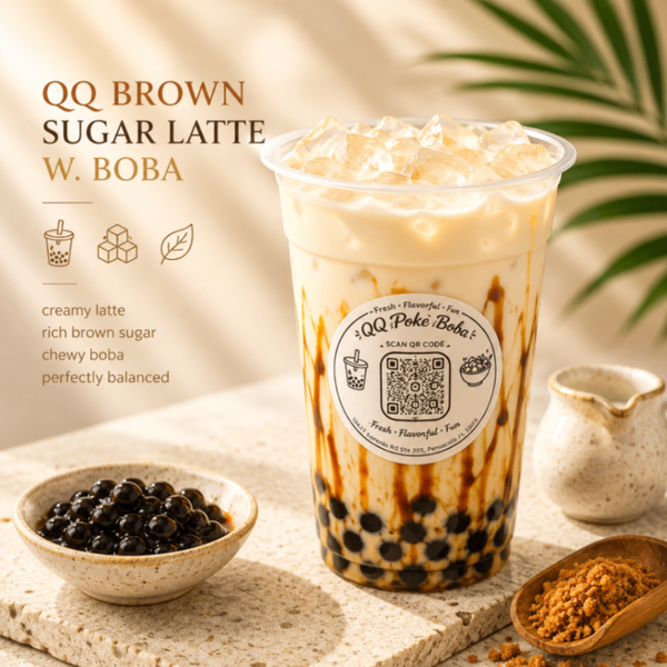QQ brown sugar latte with boba in a clear cup, creamy topping, and black tapioca pearls on a beige tabletop
