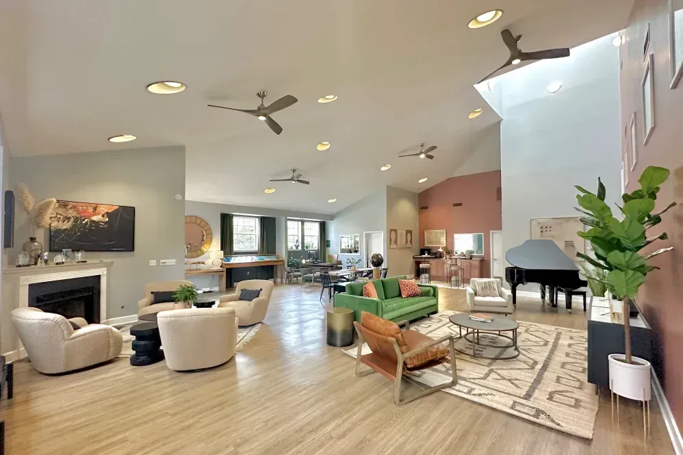 A living room filled with furniture and a piano at Glade Creek, VA.