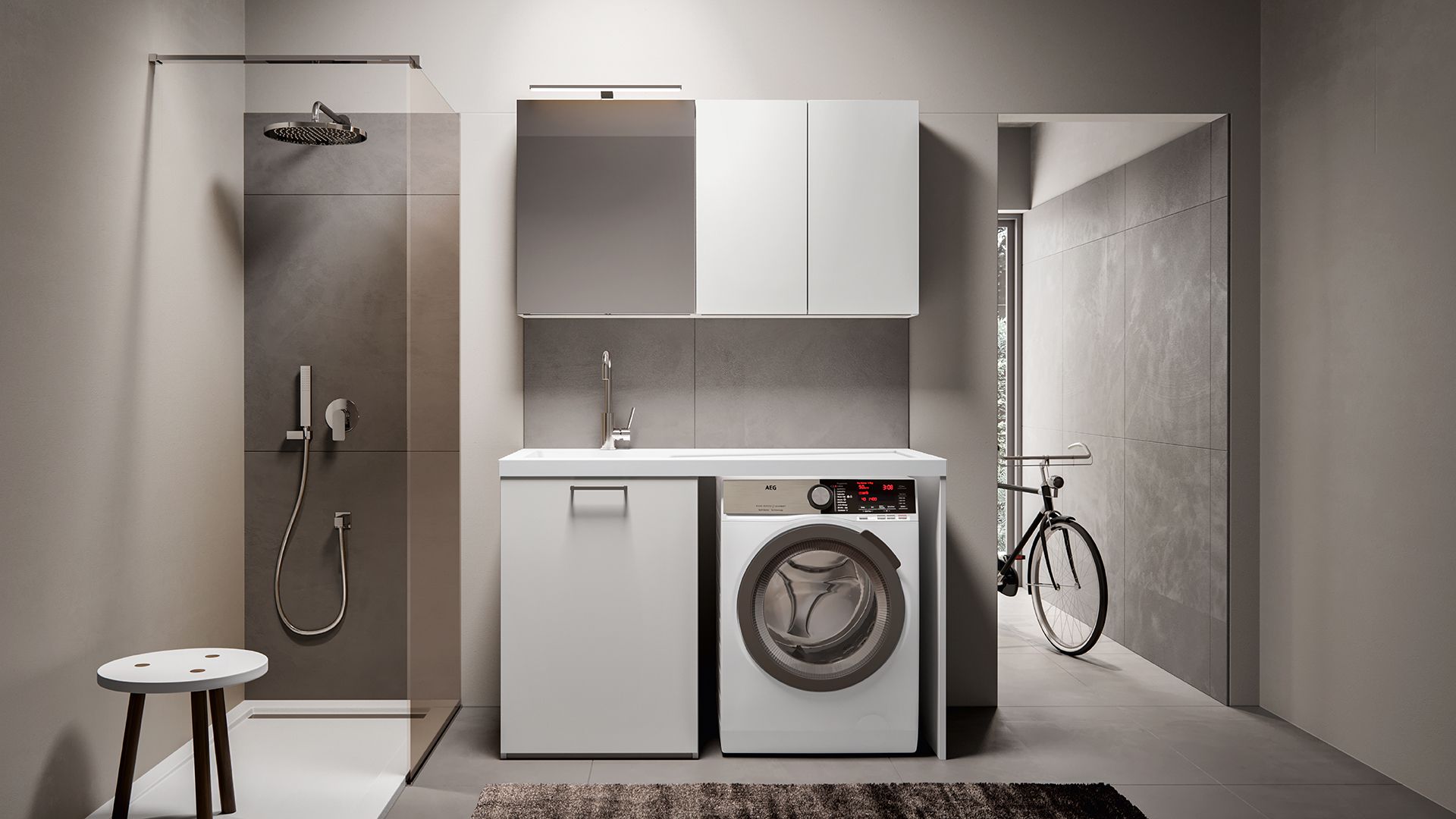 Ambiente bagno raffinato con specchio ampio e finiture sobrie.