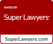a red sign that says `` rated by super lawyers '' on it .