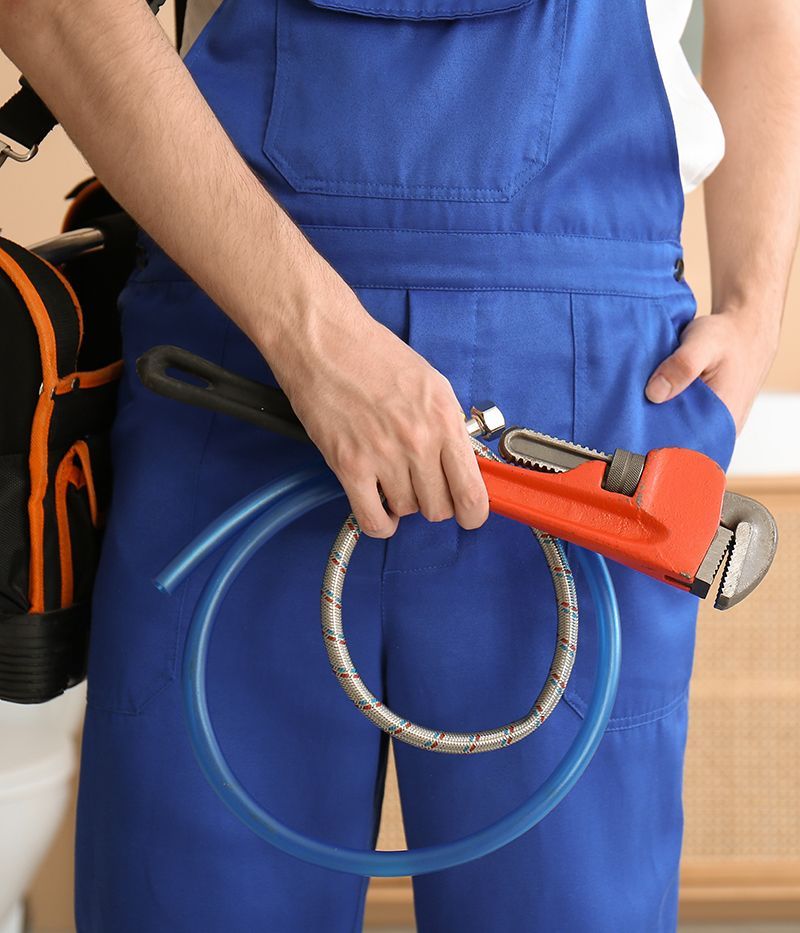 Worker Holding Wrench Worker Holding Wrench