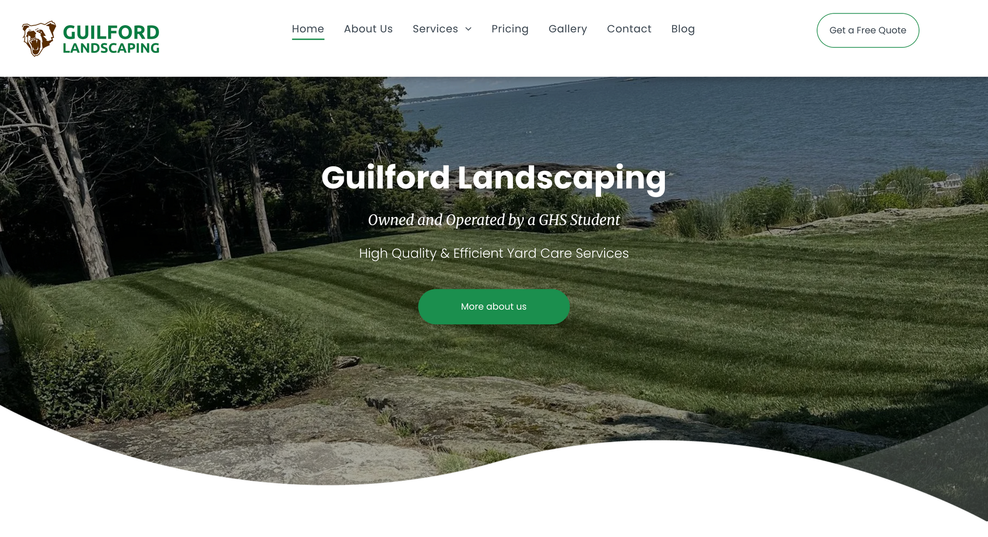 Guilford Landscaping homepage with hero photo of a manicured lawn and green call-to-action button