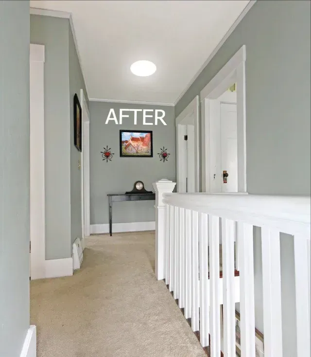 A hallway with a picture on the wall that says after.