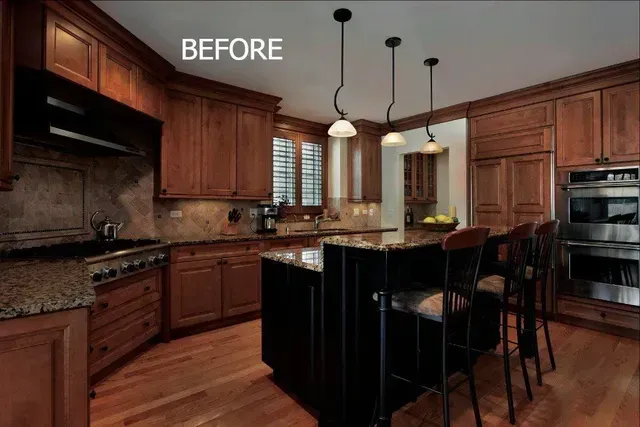 A before picture of a kitchen with wooden cabinets and stainless steel appliances.