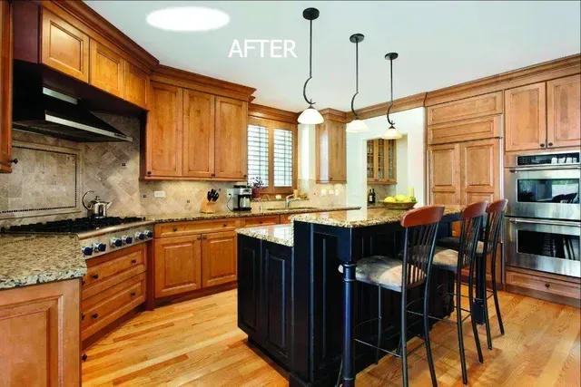 A kitchen with wooden cabinets and granite counter tops.
