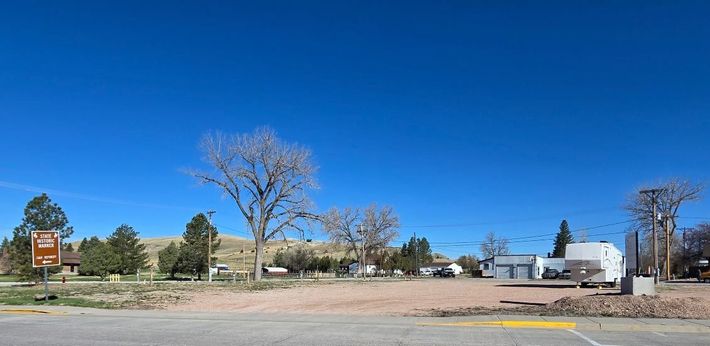 A gravel lot with full hookups.