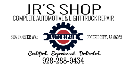 A logo for jr 's shop auto repair with a red gear and a wrench.