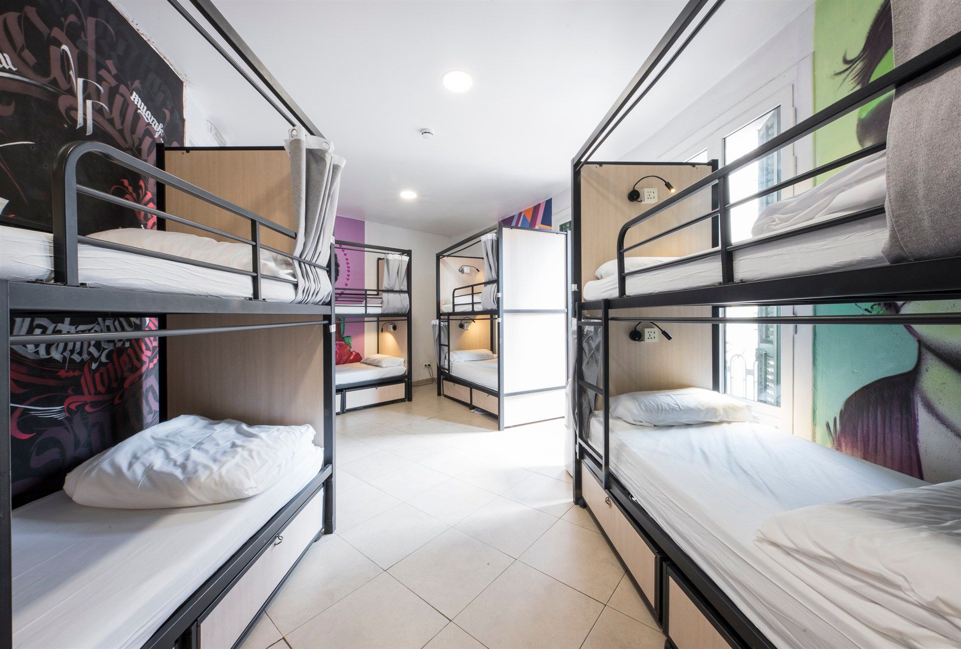 There are many bunk beds in this room.
