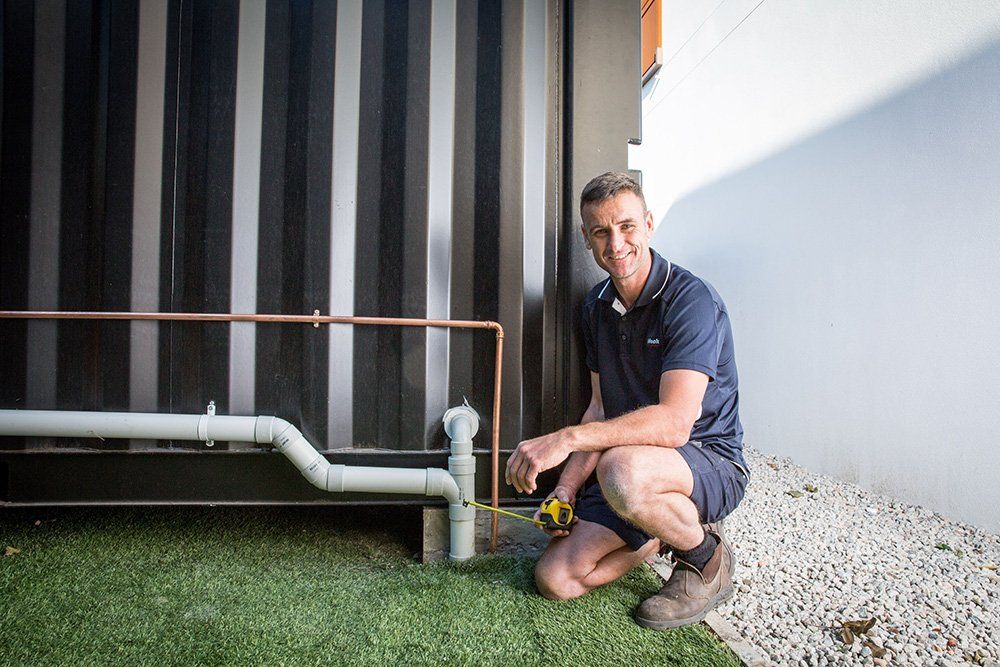 Plumber Measuring a Pipe — Unblock Pipe Clearing in Murwillumbah, NSW