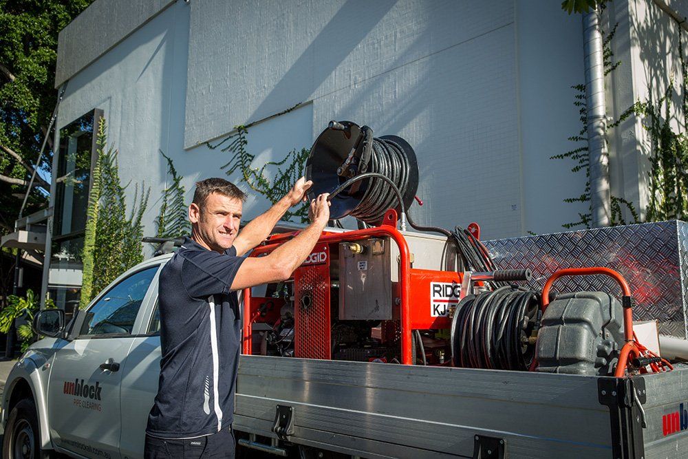 Plumber Preparing Jet Rodders — Unblock Pipe Clearing in Murwillumbah, NSW