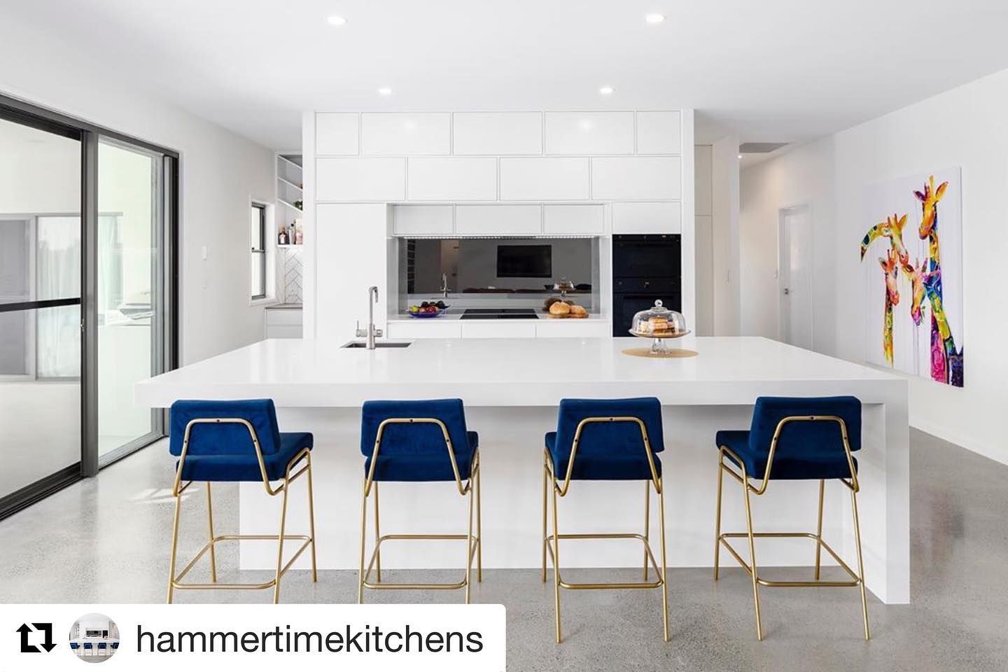 A Kitchen With Blue Bar Stools — Southeast Stone Pty Ltd In Gold Coast, QLD