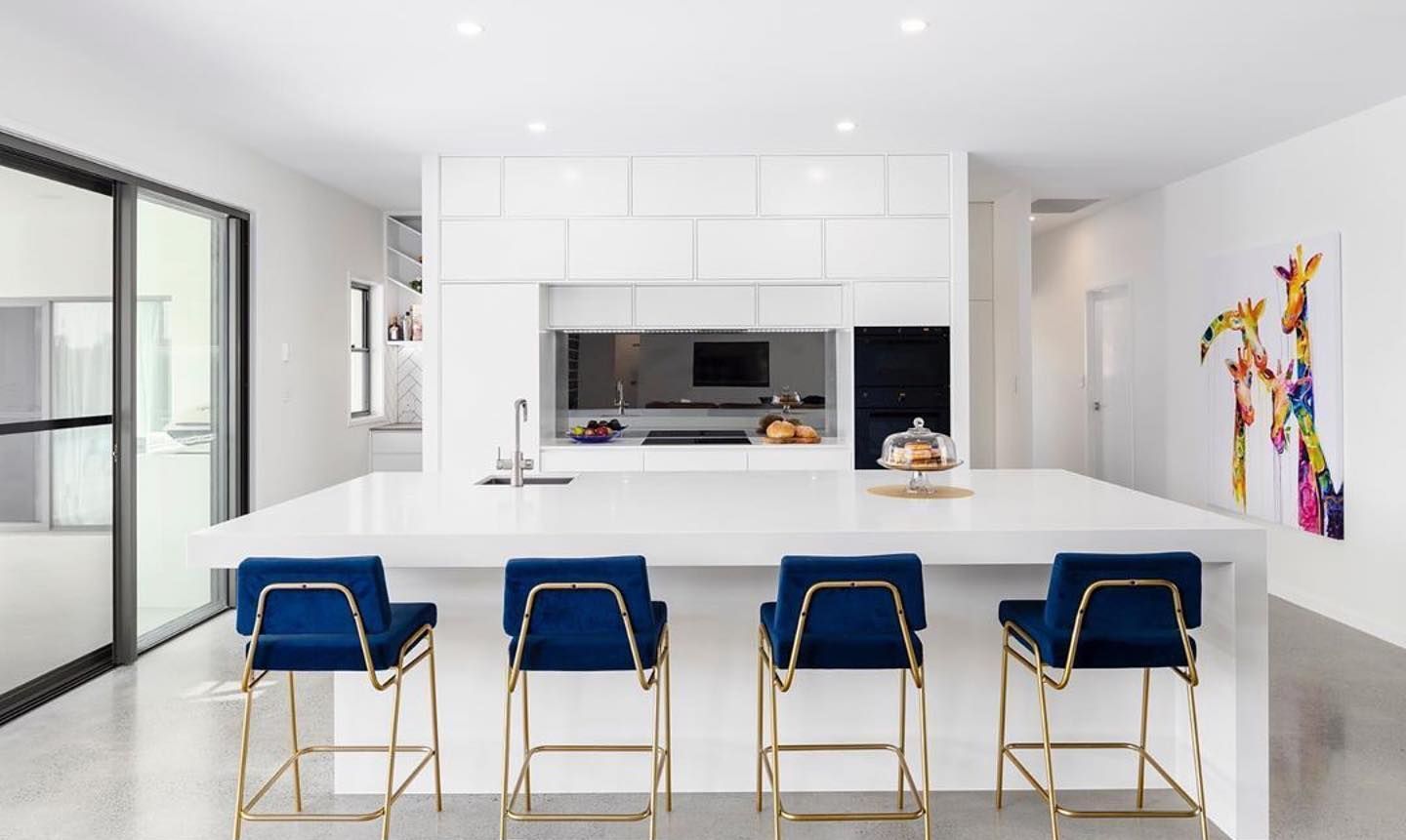 A Kitchen With Blue Bar Stools — Southeast Stone Pty Ltd In Caloundra, QLD