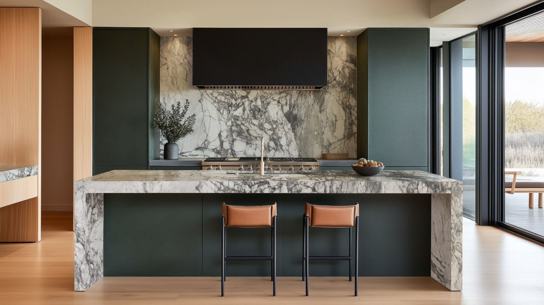 Modern kitchen with marble island, two bar stools, dark cabinets, and large windows overlooking a view — Southeast Stone Pty Ltd In Caloundra West, QLD