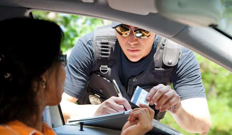 Policeman Giving Ticket To Traffic Violator — Aylett, VA — Palmer Law Firm Policeman Giving Ticket To Traffic Violator — Aylett, VA — Palmer Law Firm